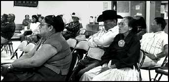 Listening to speakers at the Cove Chapter House.