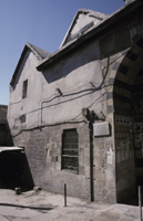 Jâmi` al-Jadîd, east exterior, showing location of inscription under windows at left.