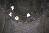 Tomb, vault.