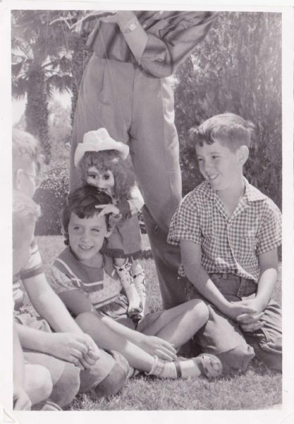 dianneenjoyingapuppetshowapr1955.jpg