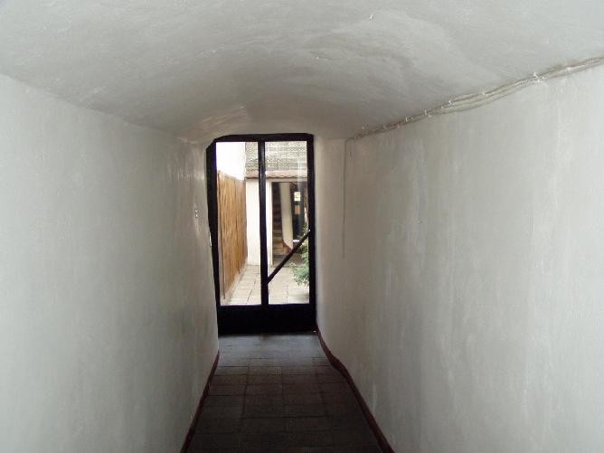 prague20060408_apt005.jpg - Hallway to courtyard and second hallway to Trziste 8 front door of apartment building.