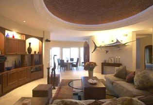 Large living room with entertainment area.