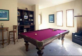 Game room includes pool table.