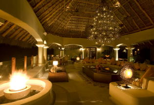 Enormous thatched palapa with estrella chandelier