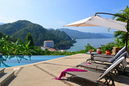 Pool terrace with view looking south towards Bay and Jungle.