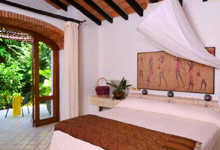 Bedroom suite with garden view.