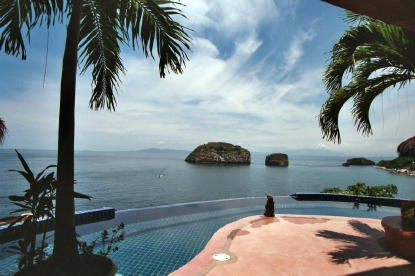 Ocean front terrace which offers a "healthy" sparkling infinity pool.