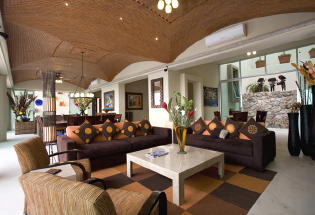 Large living and dining area with view of Banderas Bay.