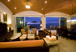 Living area at night with view.