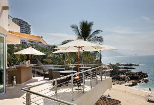 View looking south from main terrace sitting area with wet bar.