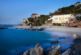Looking North towards the city and Casa Guillermo with beach in front.