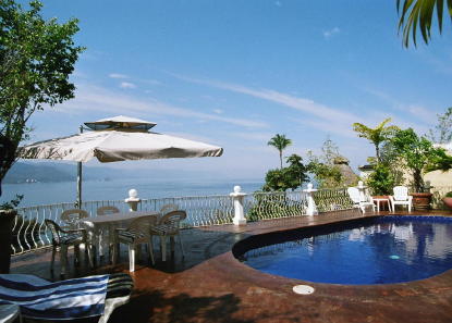 View of pool and beach below Mstr. Bedroom