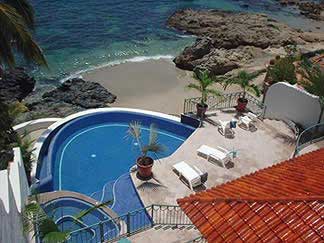 View of pool and beach below Mstr. Bedroom