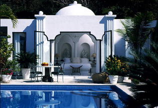 Private lounging beds at poolside.