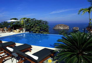 Large Infinity pool with view of bay.