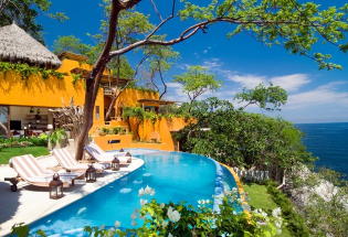 Infinity pool and terrace look out over Banderas Bay.