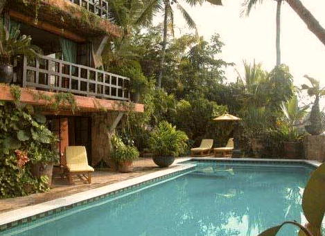 Large swimming pool and terrace with view of Banderas Bay.