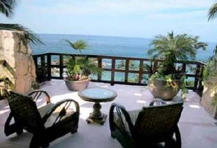 Bedroom balcony looks out onto bay.