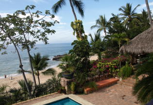 Looking out over pool to beach and bay.