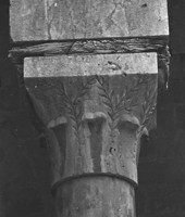 Bell-shaped capital.