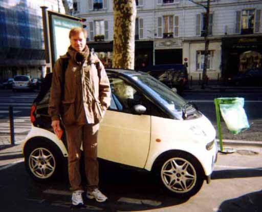 picture of guillaume beside a mini car