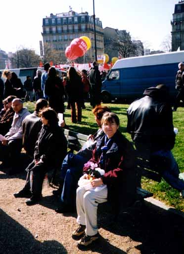 picture of margueritte on a bench at a peace rally in 
				place de la nation in paris