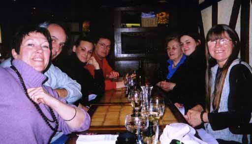 picture of margueritte miniclier with her meneclier 
				cousins at a restaurant